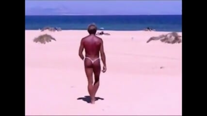 Tanned Guy On Beach In Tiny String Thong (Temporarily!)